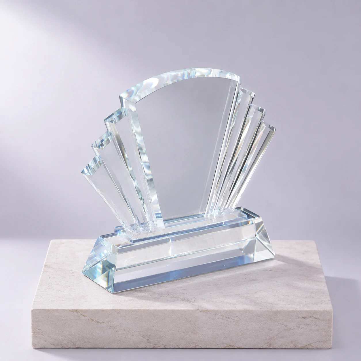 Aurora Crystal Award: fan-shaped clear crystal trophy with stepped wings and a bevelled base